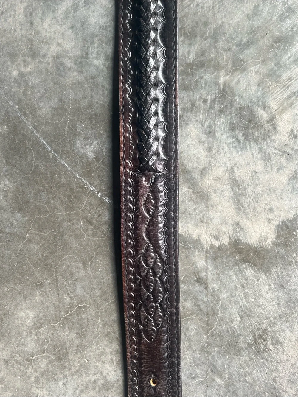 Vintage Levi's black tooled leather western belt with rotating harness buckle